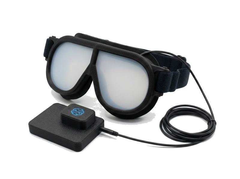 Visual Occlusion Goggles in closed (opaque) state with controller